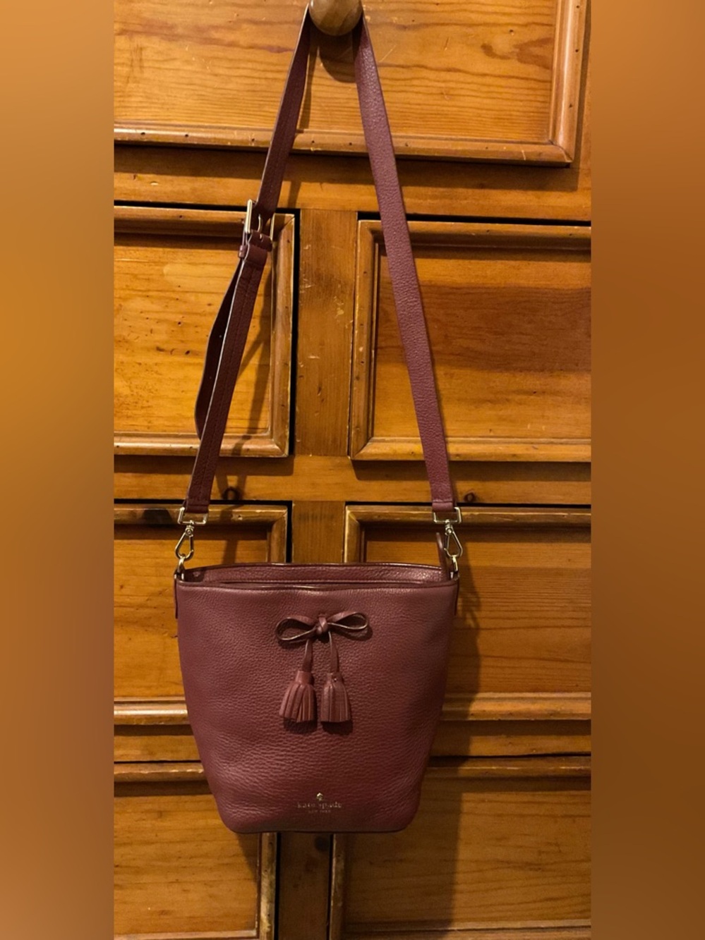 kate spade Burgundy Pebbled Leather Tassel Crossbody Bag